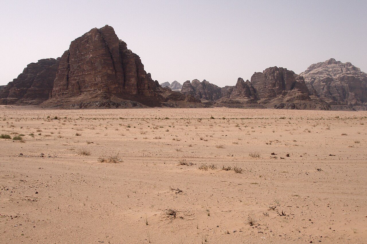 The Seven Pillars of Wisdom rock formation in Wadi Rum, with two annotated hotspots.